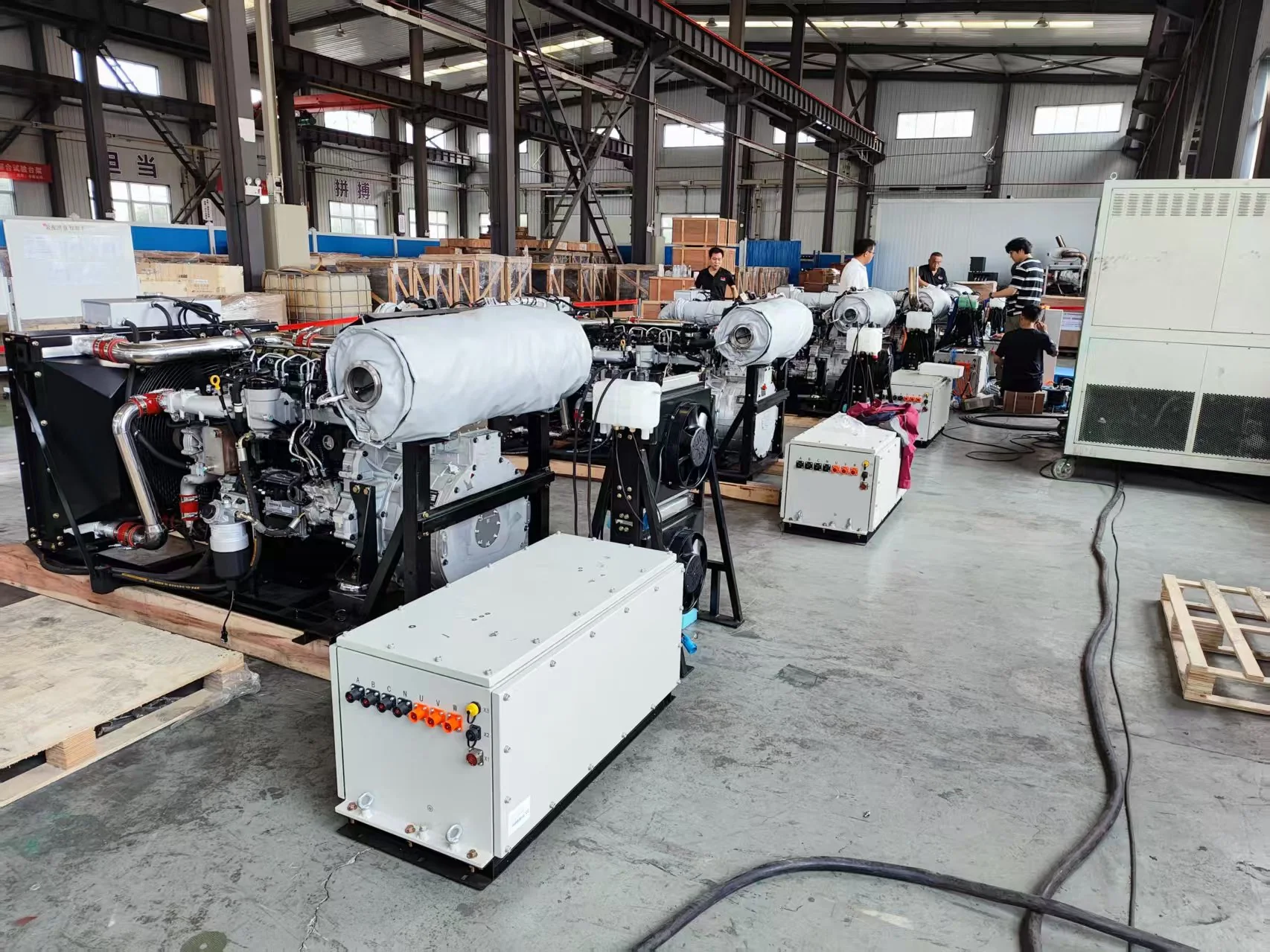 Mobile generator systems and converter cabinets during production