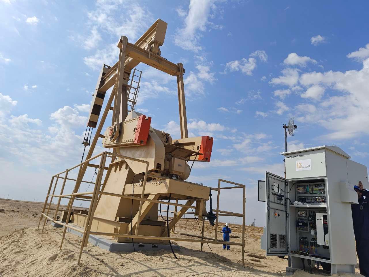 Pumpjack and Wolong intelligent control cabinet at an oil field
