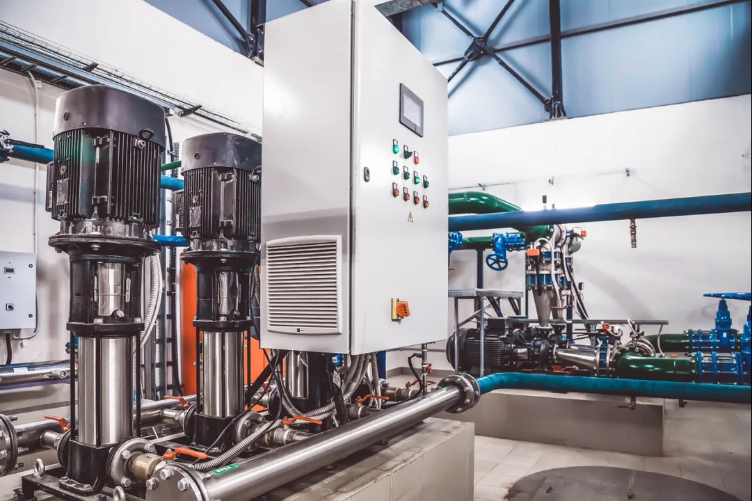 Vertical pumps and a central control cabinet in a water system